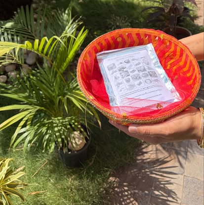 Indigenous seed packets of the Community Seed Bank, held in a decorated basket