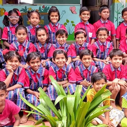 Schoolchildren from the communities Arihant Foundation serves, gathered and smiling